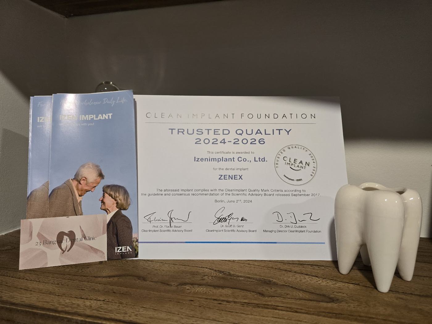 Certificate and tooth ornament